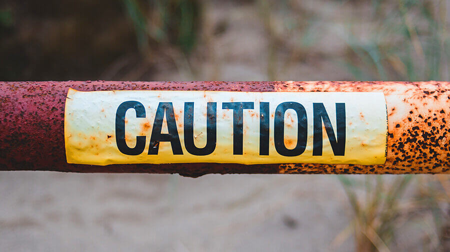Caution Tape holding back Branding Mistakes That Sabotage Your Freelance Success